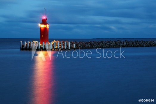 Bild på Hou lighthouse at the blue hour in Denmark